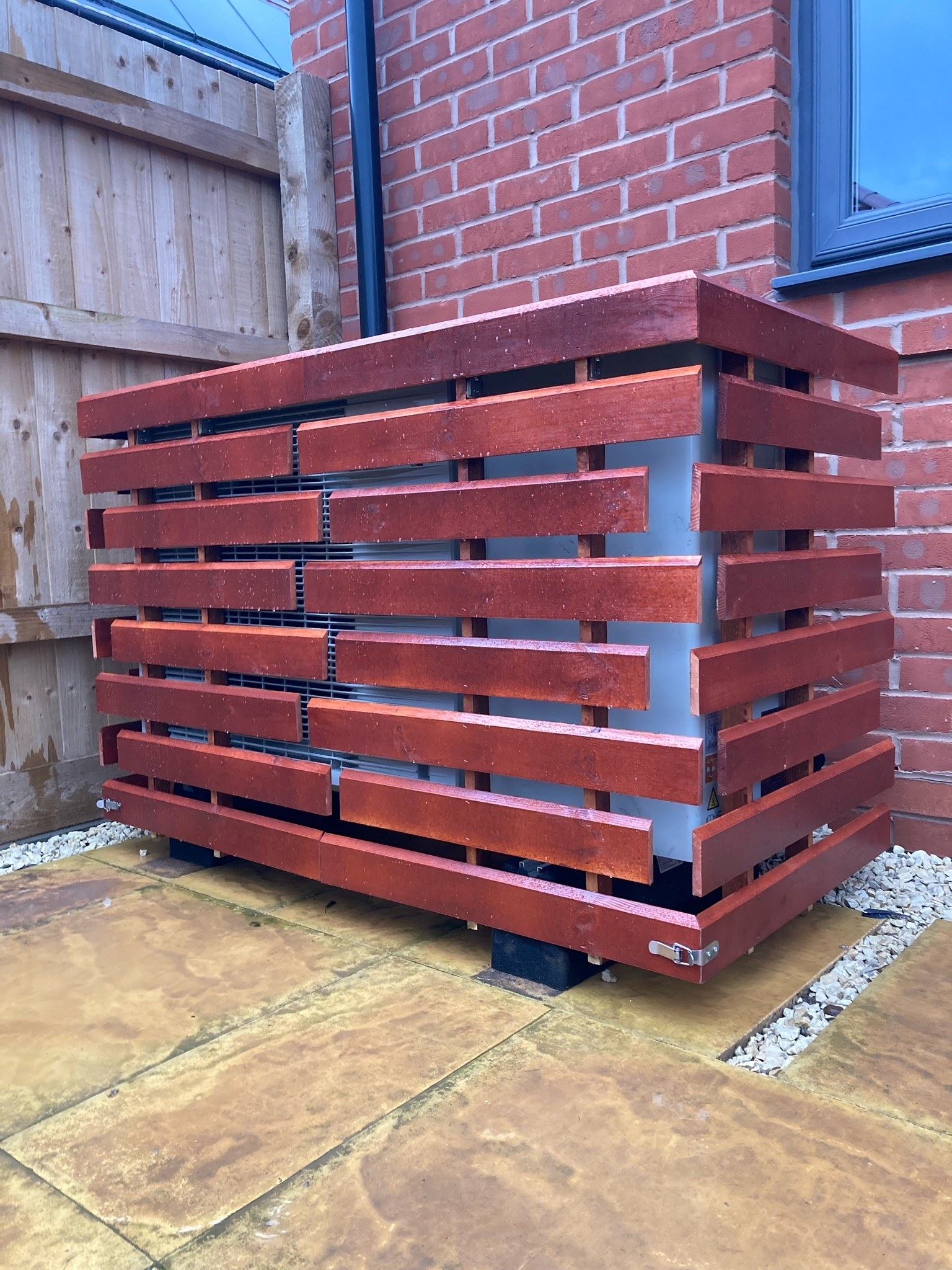 Heat pump cover in redwood