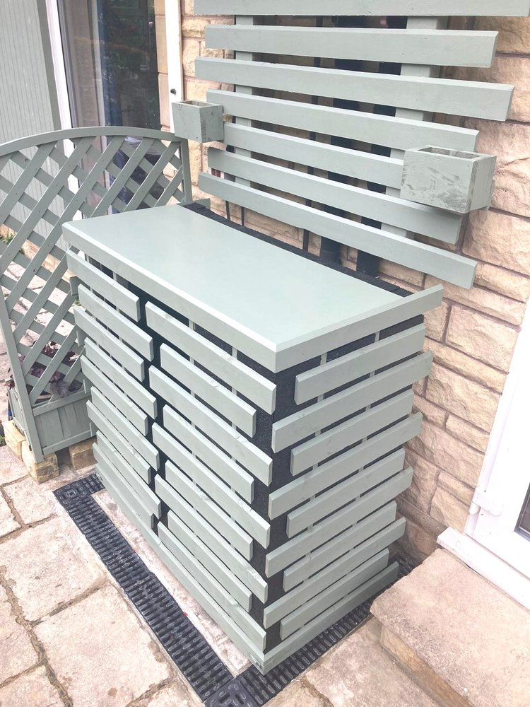Single fan heat pump cover in green glad with noise reduction and hanging planters