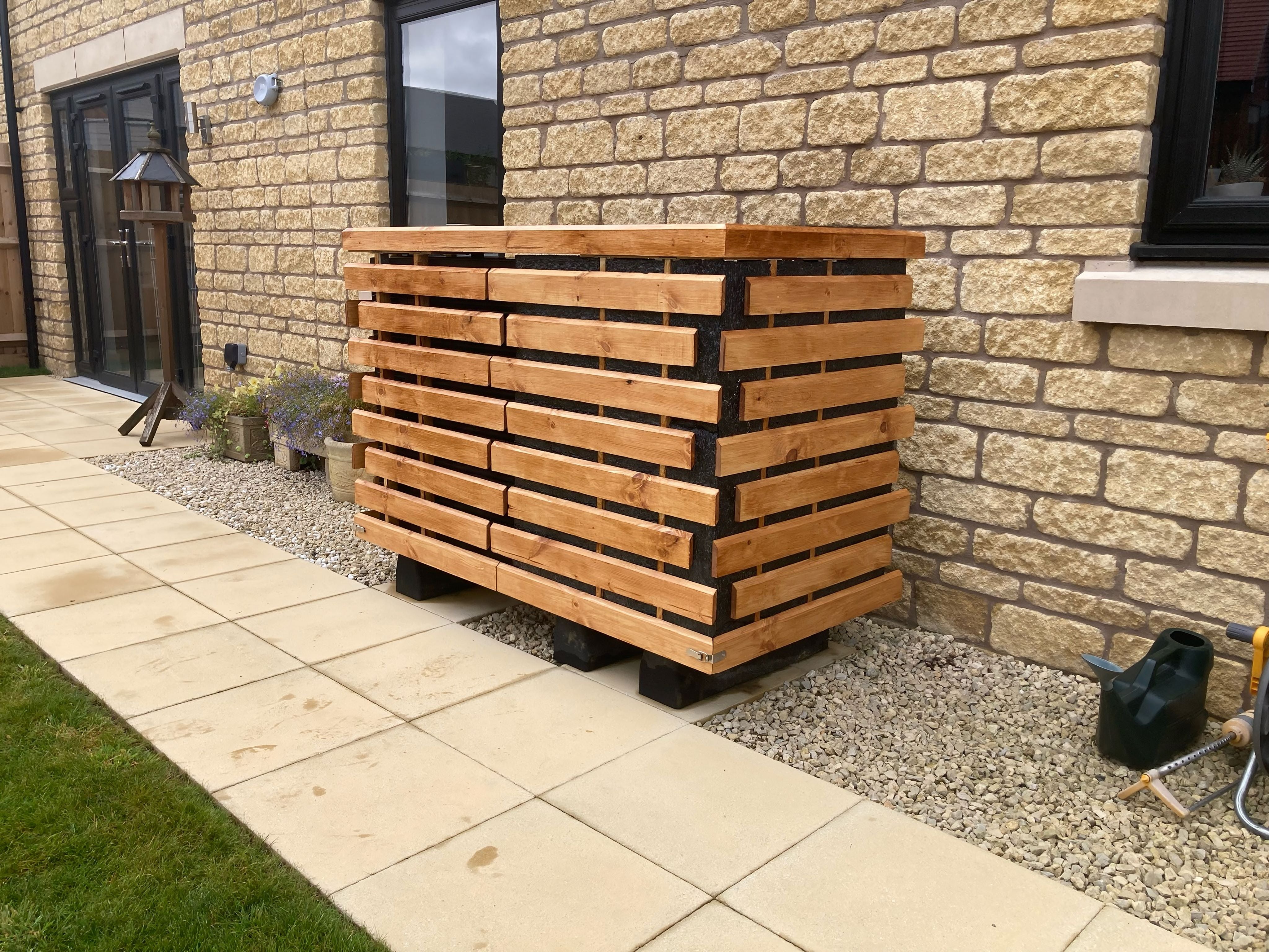 Single fan heat pump cover in natural oak